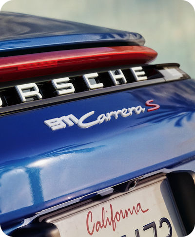 Porsche 911 Carrera S rear badge and blue bodywork