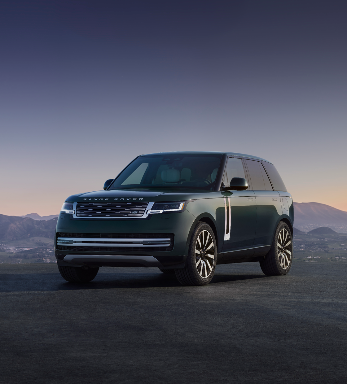 Range Rover front three-quarter view at dusk